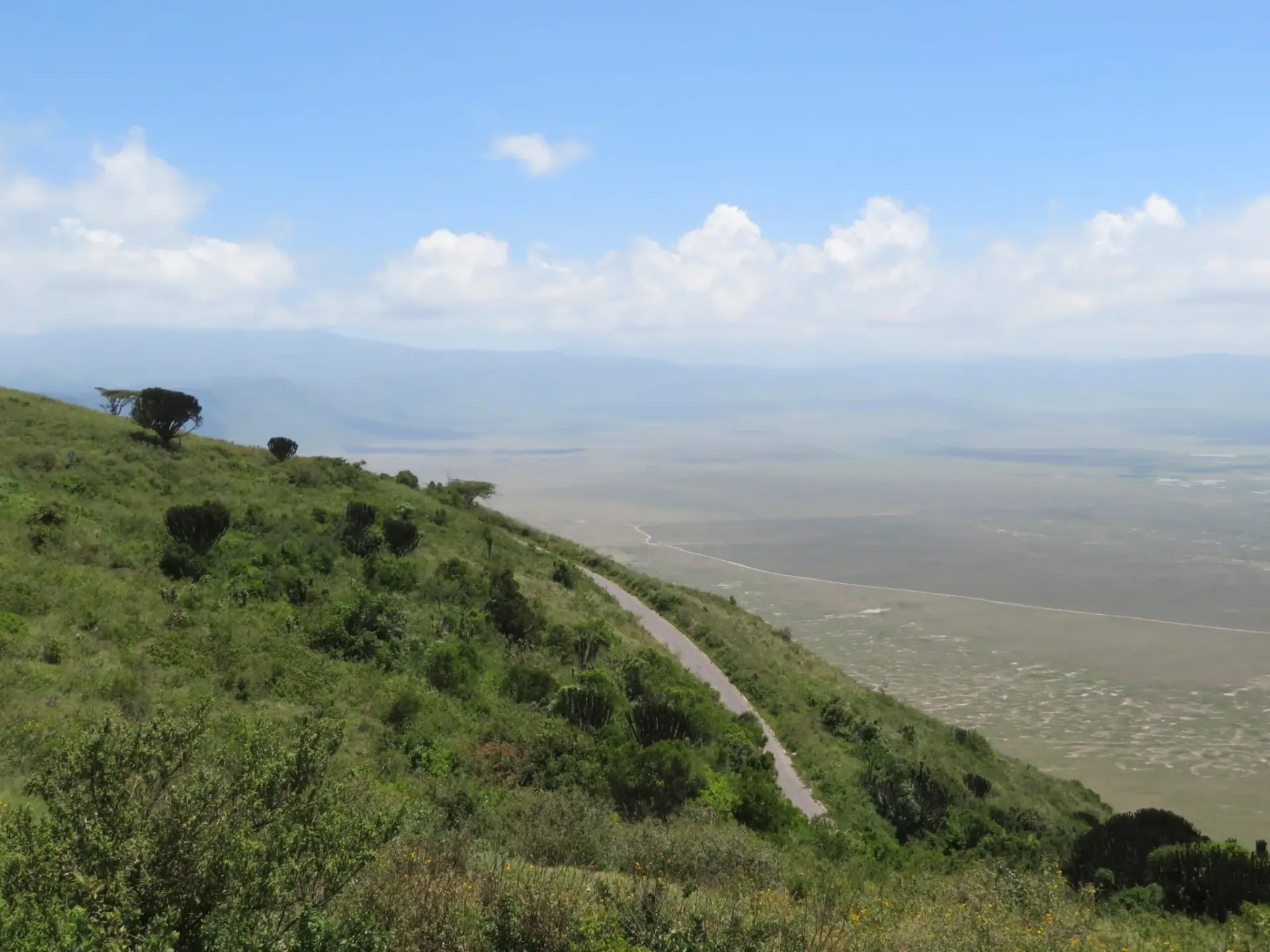 Winding descent road leading from the Ngorongoro crater rim to the crater floor